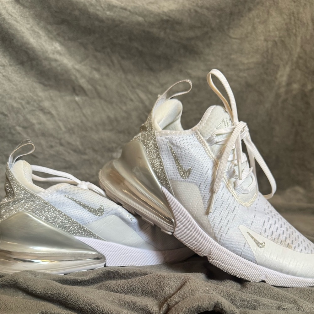 Nike White and Silver Sneakers with Breathable Upper and Supportive Sole